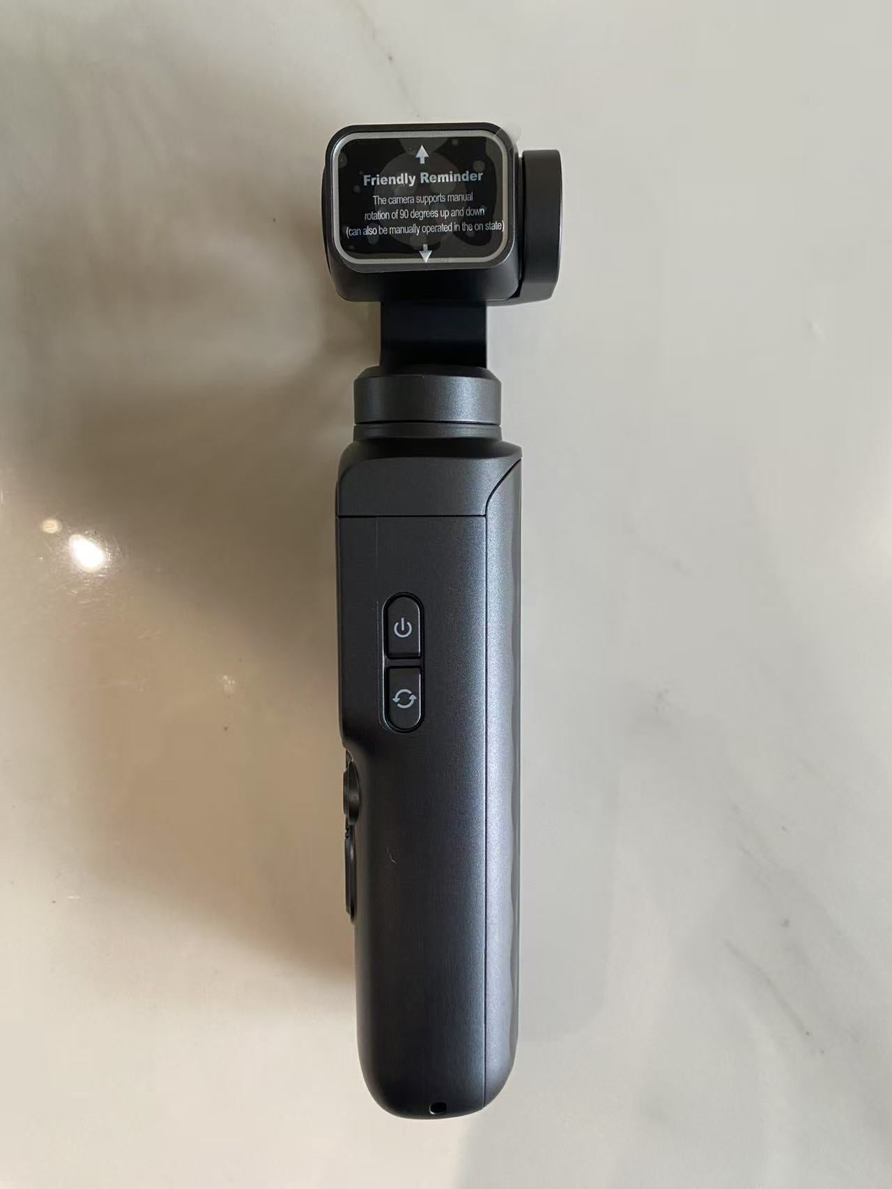 Compact handheld stabilizer camera lifestyle view for creators